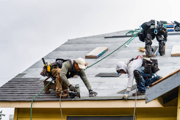 Professional Gutter Installation technician working in Milton, WA